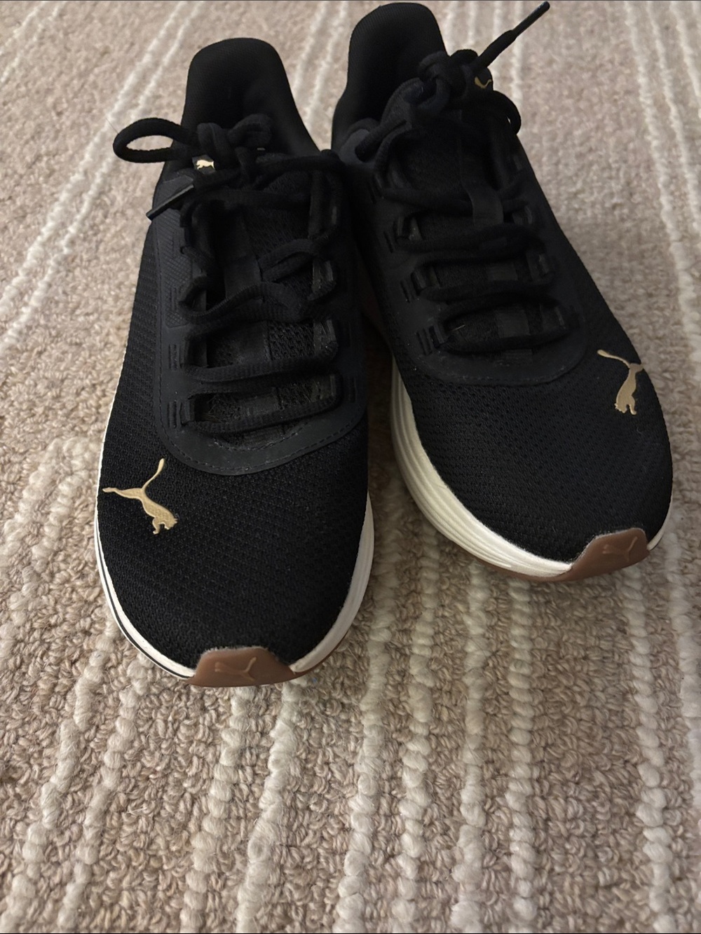 Puma Women's Black Athletic Sneakers with Gold Logo